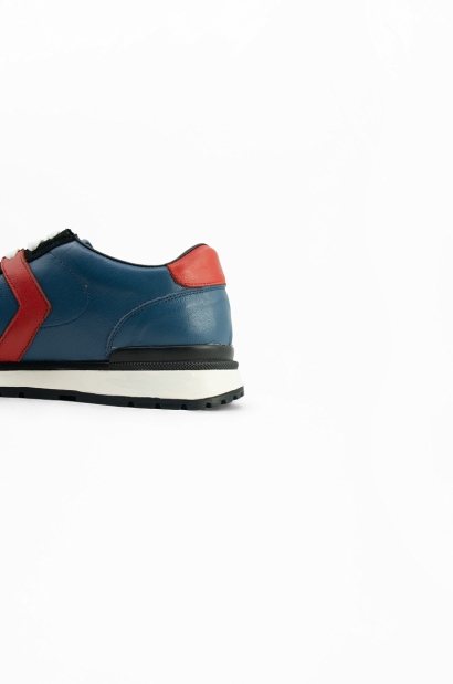 zapatillas de piel Old Rowley: Estilo vibrante en azul, rojo y negro - vista lateral detalle talón cerca