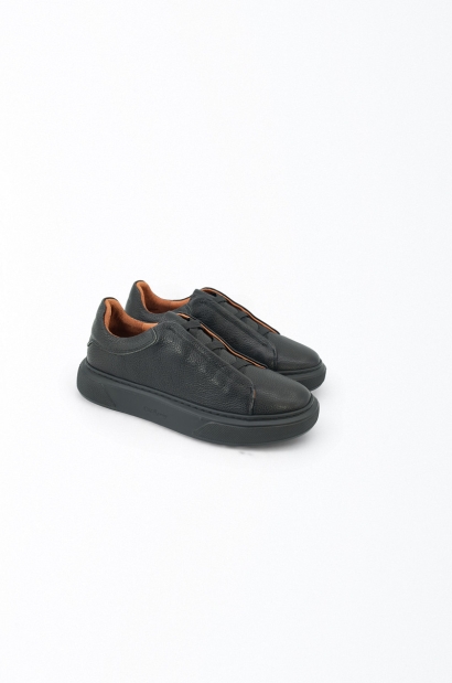 Zapatillas piel natural sin cordones con ajuste elásticos Old Rowley color negras - vista lateral par