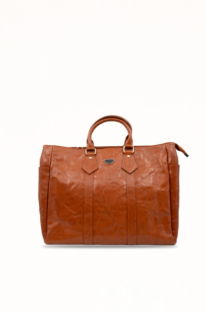 Bolsa de viaje de piel marrón Old Rowley con bandolera - vista frontal